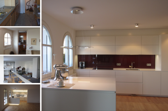 Moderne Küche mit hellen Schränken, einem Insel-Bereich und rotem Wandpanel.