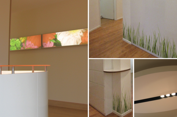 Moderne Innenansicht mit bunten Wandbildern und Grasdesigns an den Wänden.